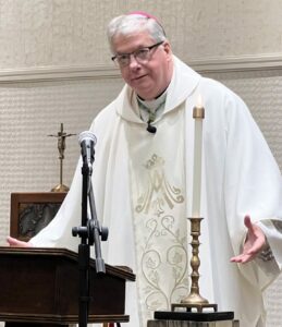 Bishop talking from pulpit