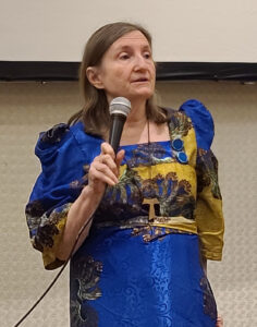 Woman at microphone
