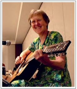 Jan Parker on guitar at the Q 2022