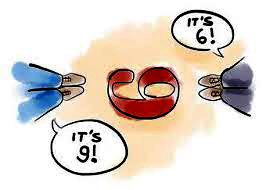View of two person's feet looking down on the number - from one person's side it is 9; for the other person it is 6