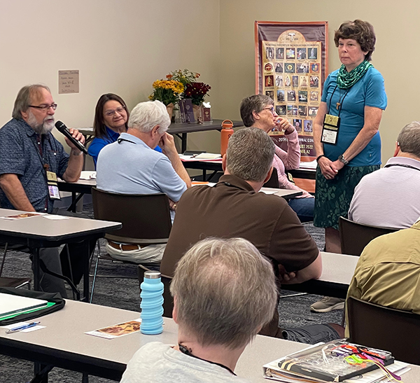 Vickie Click, OFS, leading daily reflection & sharing related to the Stigmata
